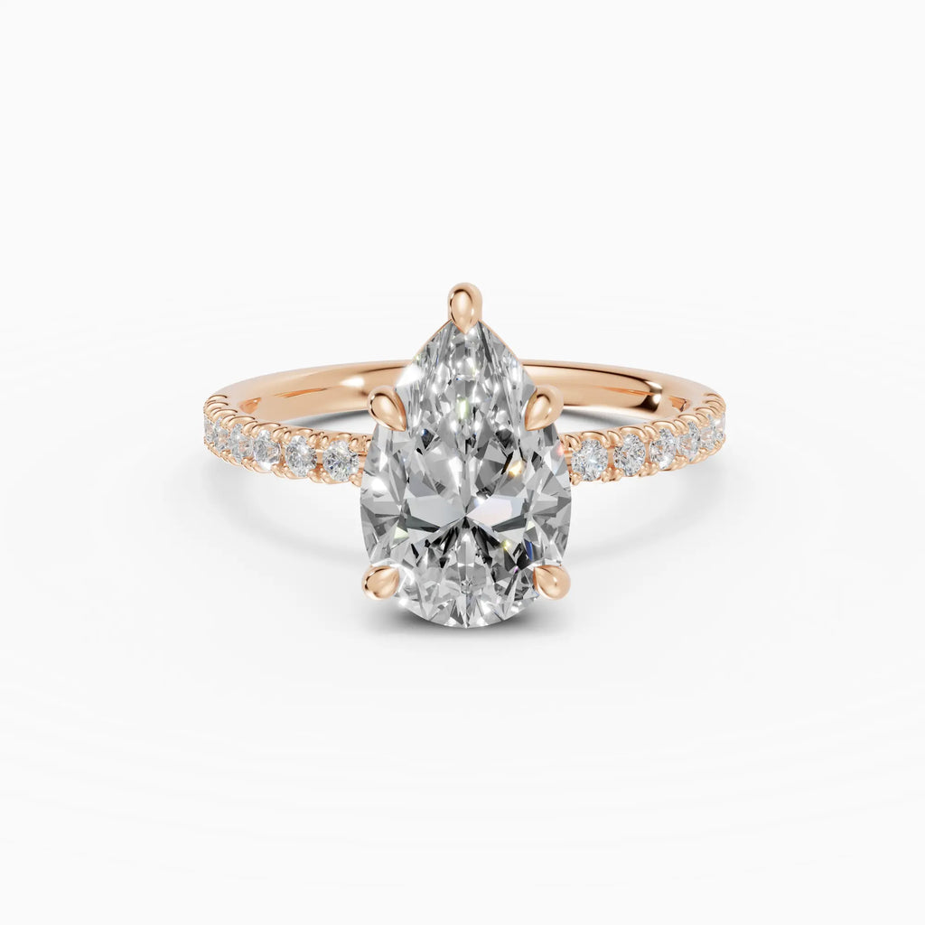 AURORA | Anillo solitario corte pera medio pavé