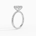 AURORA cushion half-pavé solitaire engagement ring - worn on hand