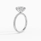 AURORA oval half-pavé solitaire engagement ring - worn on hand