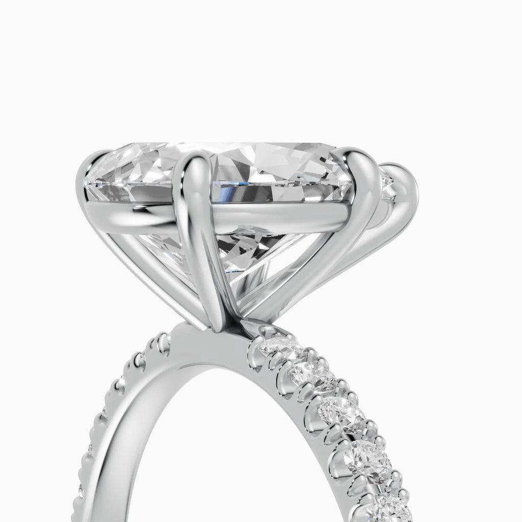 AURORA | Anillo solitario corte pera medio pavé