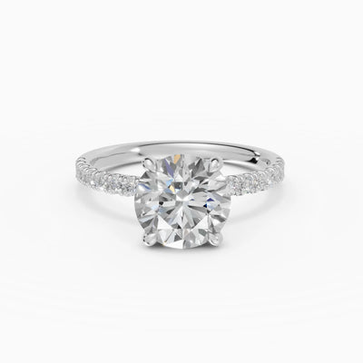 AURORA | Anillo solitario corte brillante medio pavé