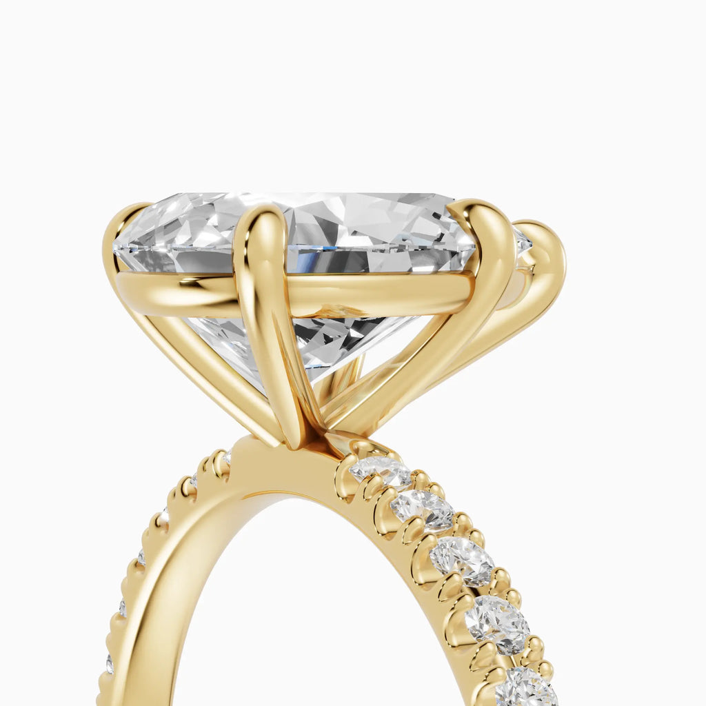 AURORA | Anillo solitario corte pera medio pavé