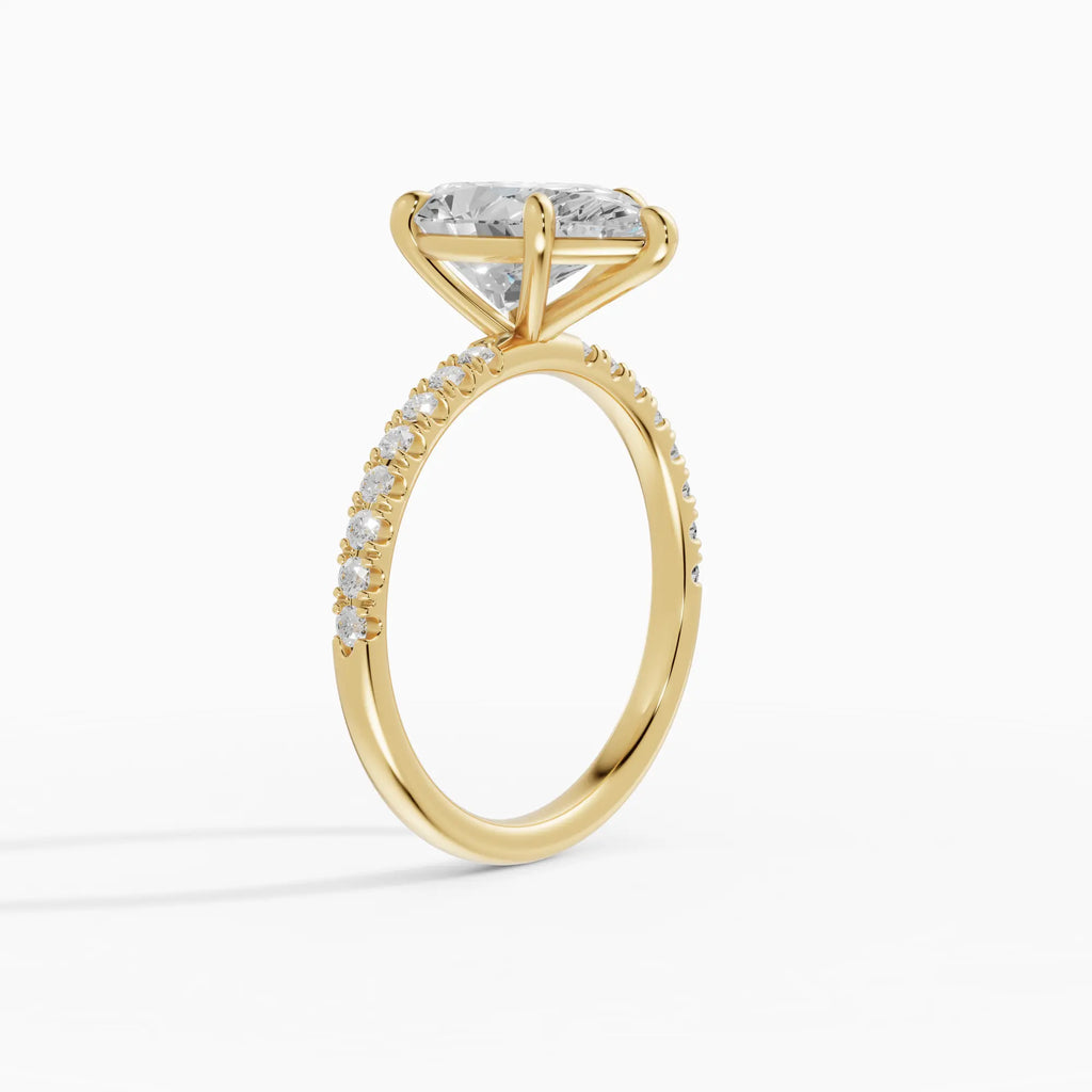 AURORA | Anillo solitario corte pera medio pavé