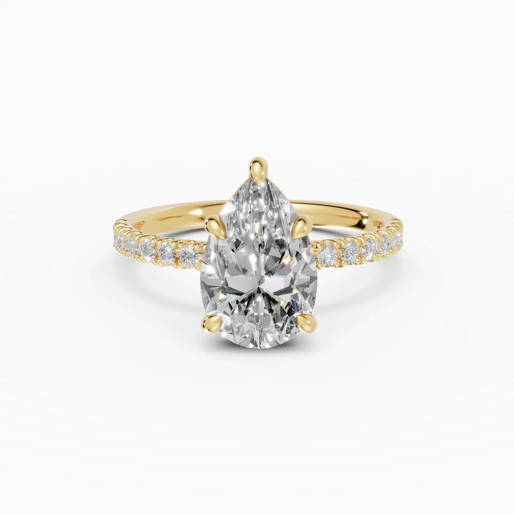 AURORA | Anillo solitario corte pera medio pavé