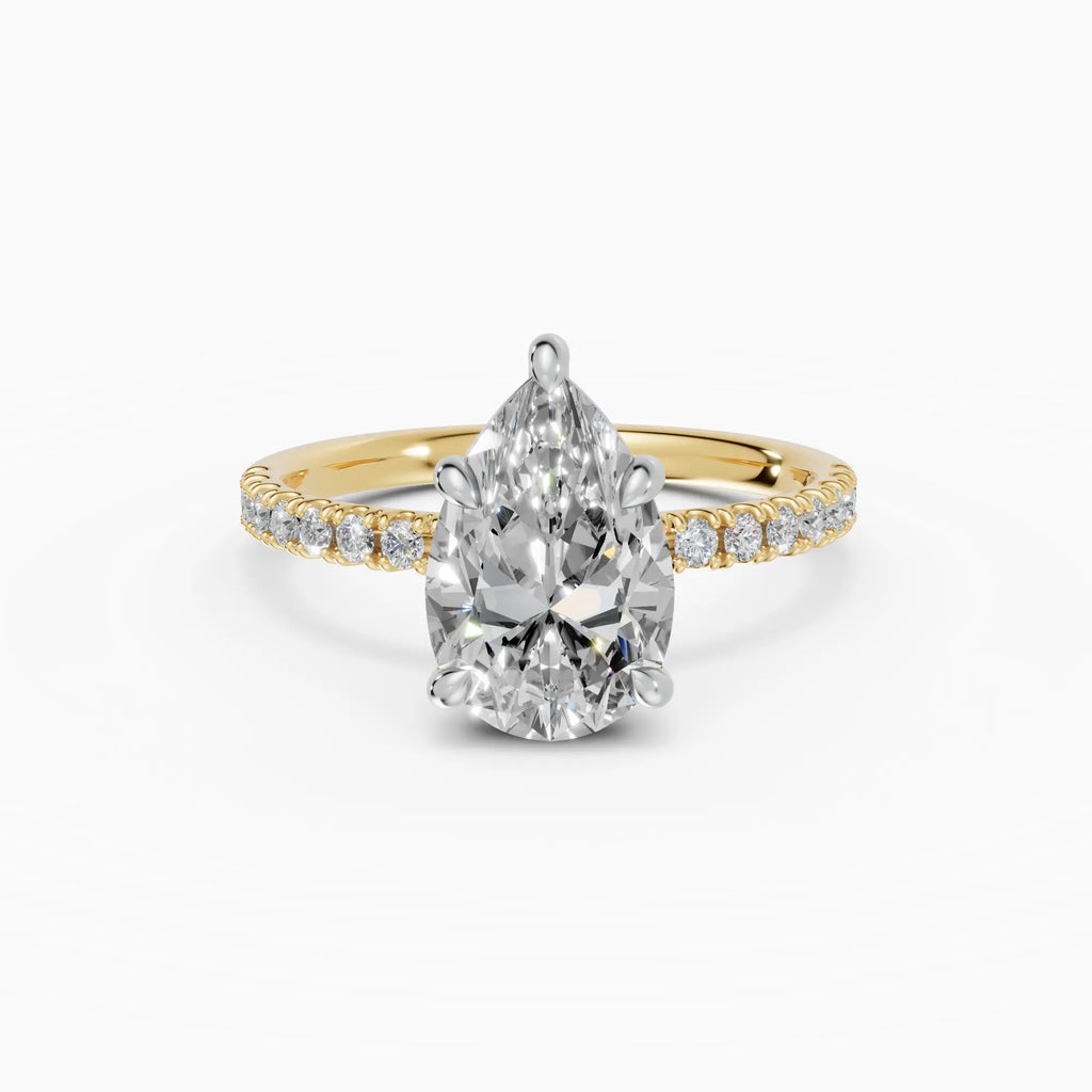 AURORA | Anillo solitario corte pera medio pavé