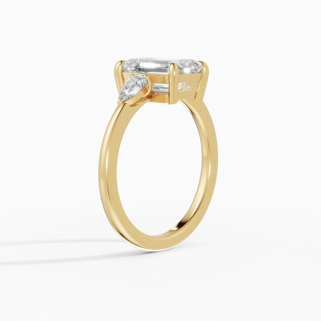 Anillo de compromiso ELARA esmeralda trilogía en oro blanco - vista lateral