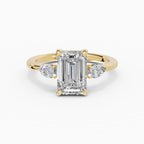 Anillo de compromiso ELARA esmeralda trilogía en oro amarillo 18k