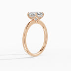 Flora engagement ring in rose gold with 2-carat cushion cut diamond
