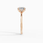Flora engagement ring in rose gold with 2-carat cushion cut diamond, profile view