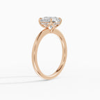 Flora engagement ring in rose gold with 2-carat round brilliant diamond, side view