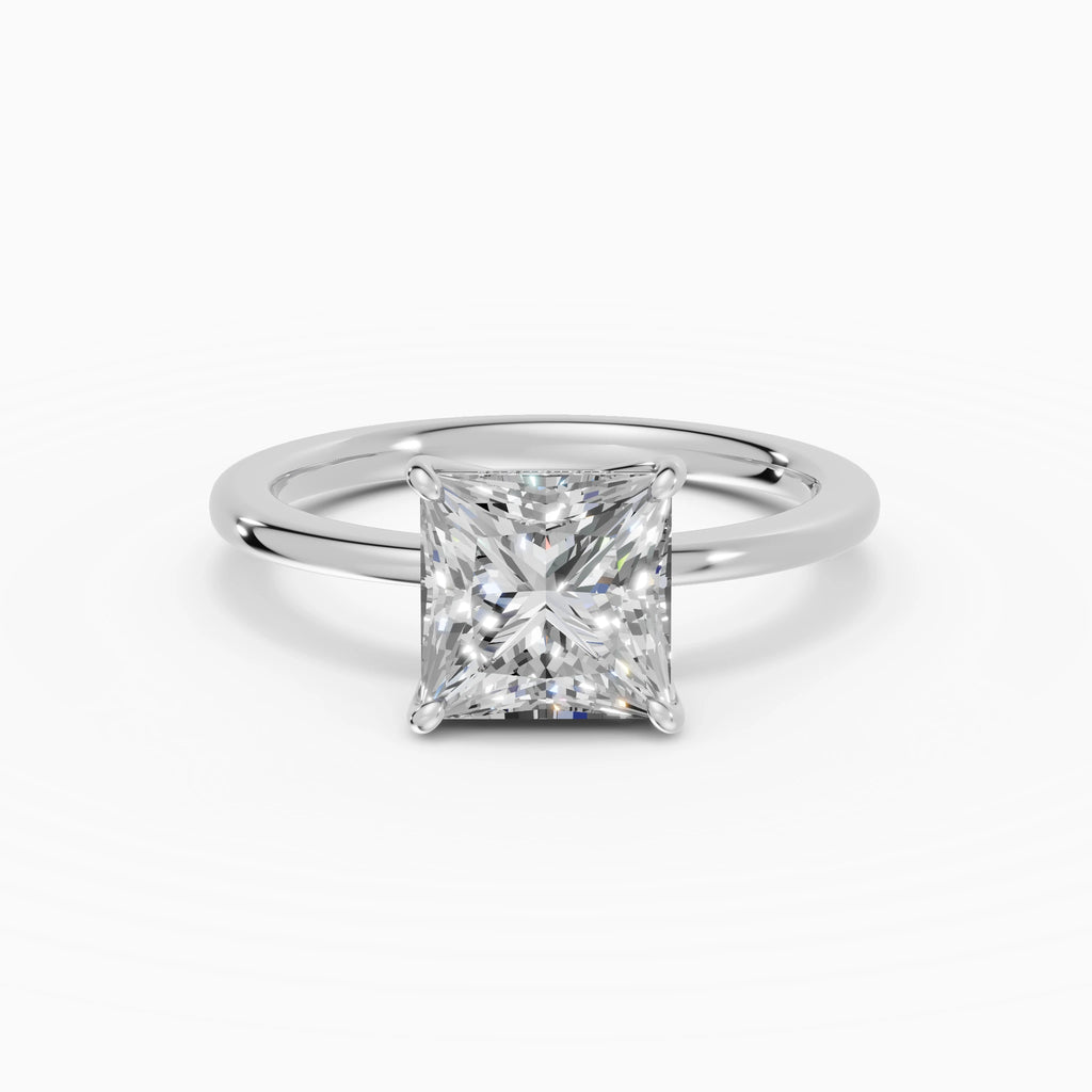 Anillo de compromiso Flora en oro blanco con diamante corte princesa de 2 quilates detalle del aro