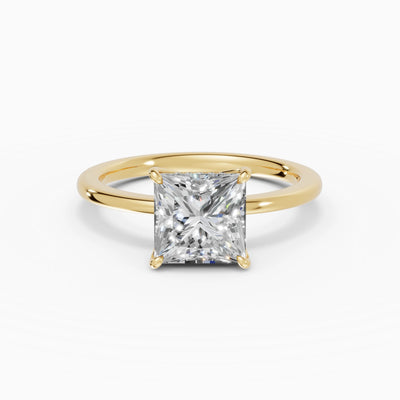 Anillo de compromiso Flora en oro amarillo con diamante corte princesa de 2 quilates detalle del aro