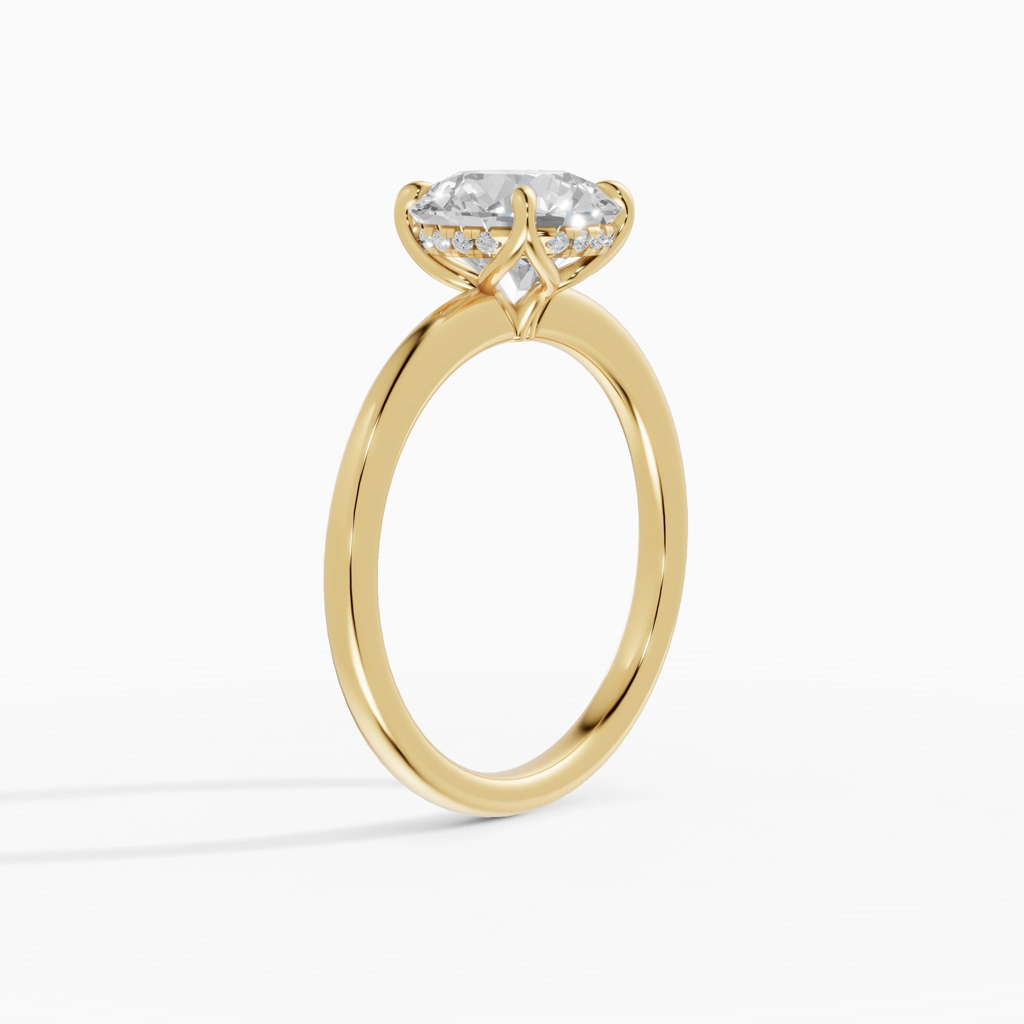 Anillo de compromiso Flora en oro amarillo con diamante corte brillante de 2 quilates vista lateral