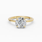 Flora engagement ring in yellow gold with 2-carat round brilliant diamond, band detail