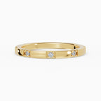 Petra engagement ring in yellow gold with round brilliant diamond, band detail