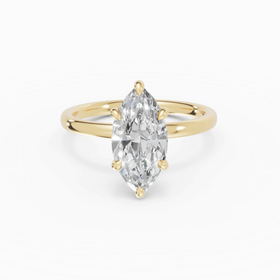 Anillo de compromiso THEIA marquesa solitario halo escondido en oro amarillo 18k