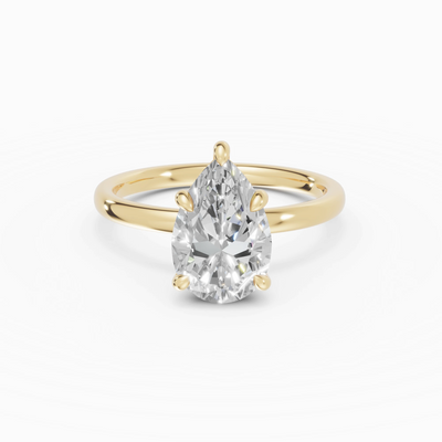 THEIA | Anillo solitario halo escondido pera