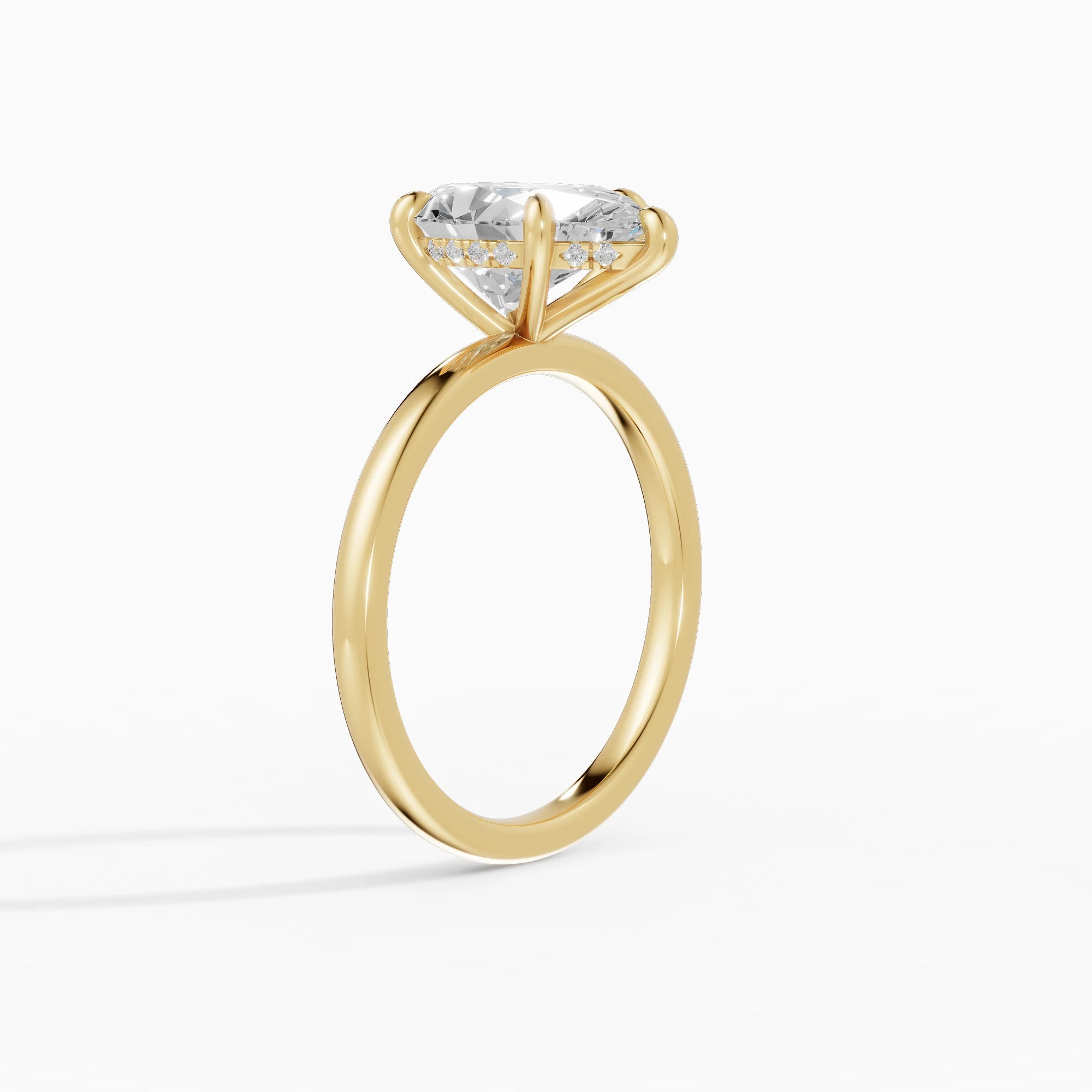 THEIA | Anillo solitario halo escondido pera