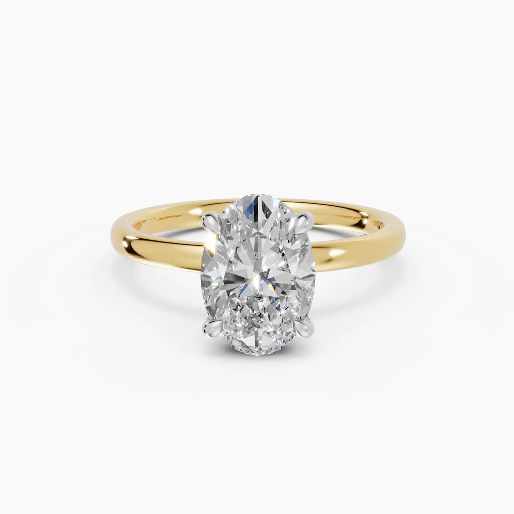 Anillo de compromiso THEIA oval solitario halo escondido