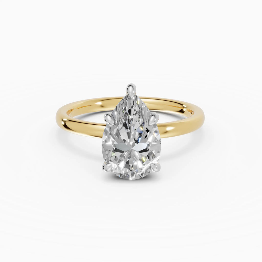 Anillo de compromiso THEIA pera solitario halo escondido