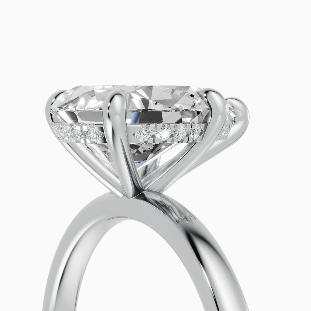 THEIA | Anillo solitario halo escondido pera