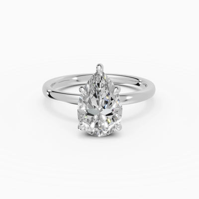 THEIA | Anillo solitario halo escondido pera