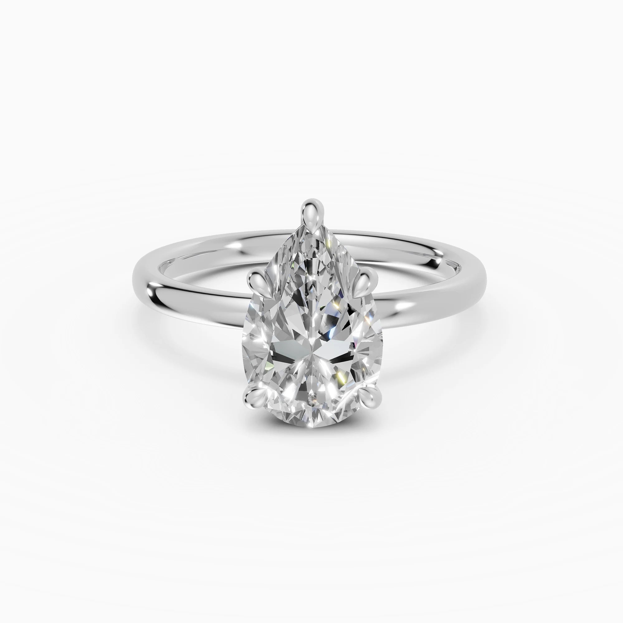 THEIA | Anillo solitario halo escondido pera