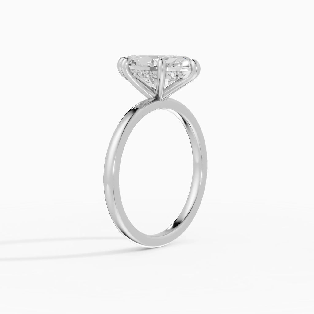 Anillo de compromiso THEIA marquesa solitario halo escondido - puesto en mano