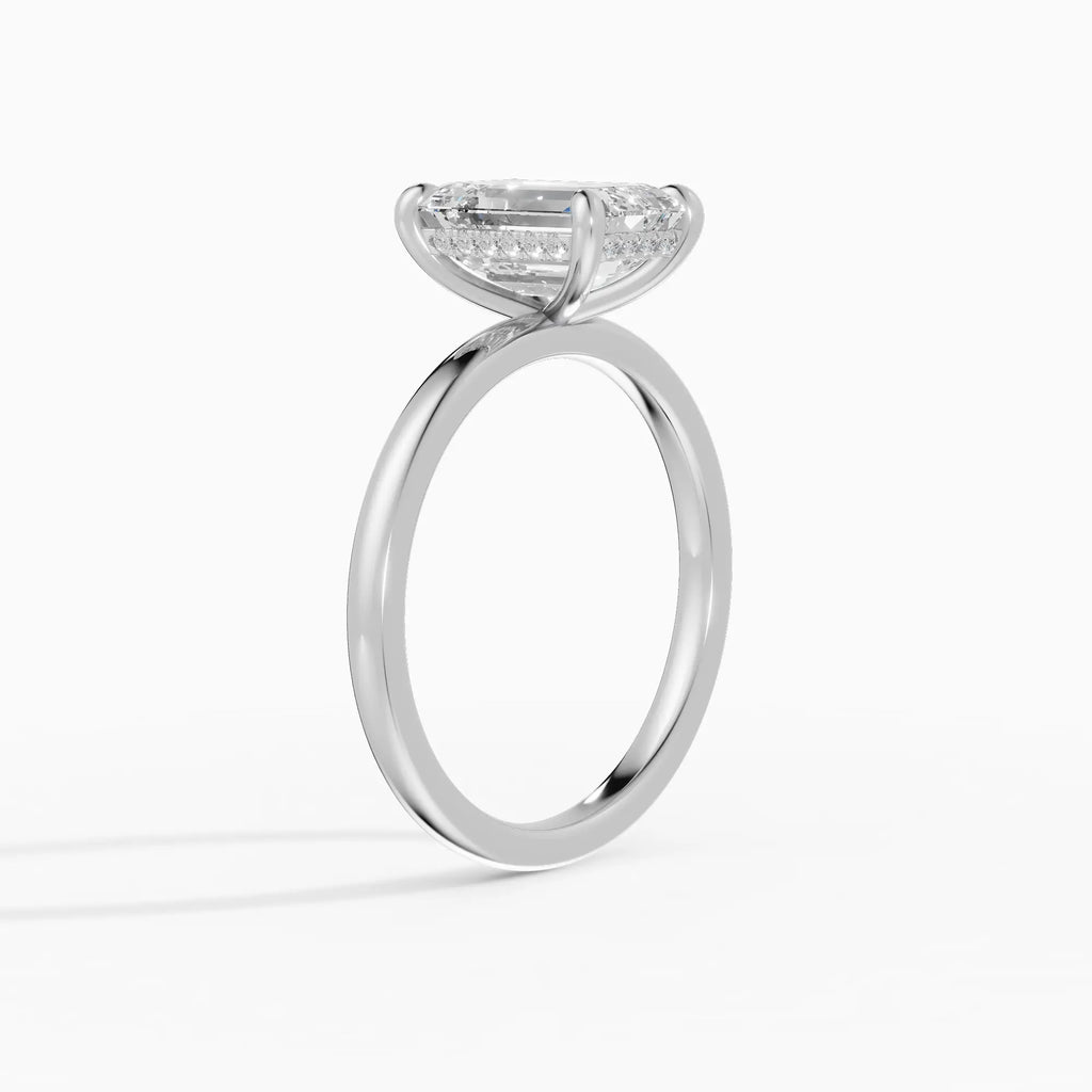 Anillo de compromiso THEIA esmeralda solitario halo escondido - puesto en mano