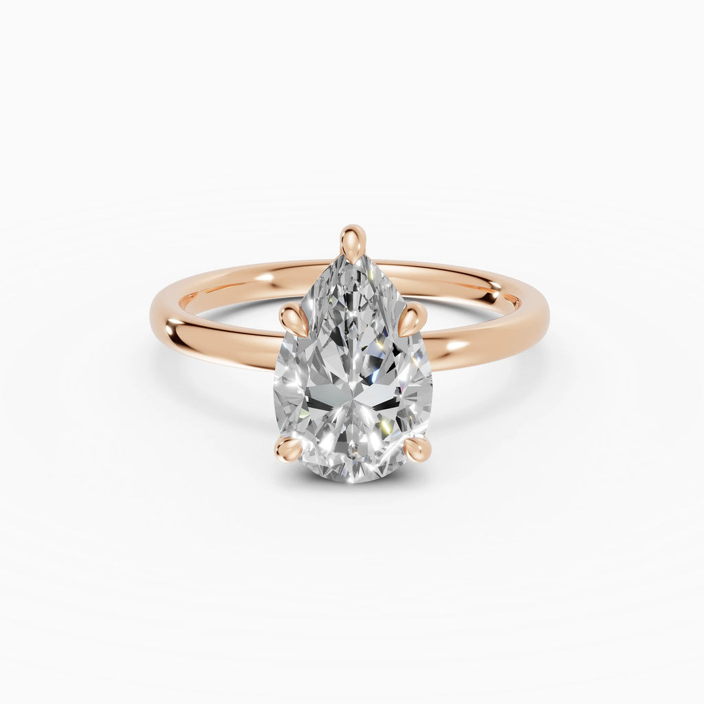 THEIA | Anillo solitario halo escondido pera