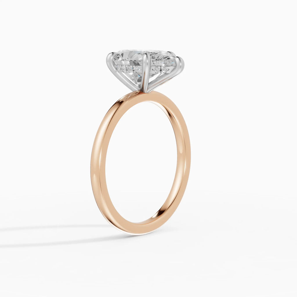 Anillo de compromiso THEIA pera solitario halo escondido