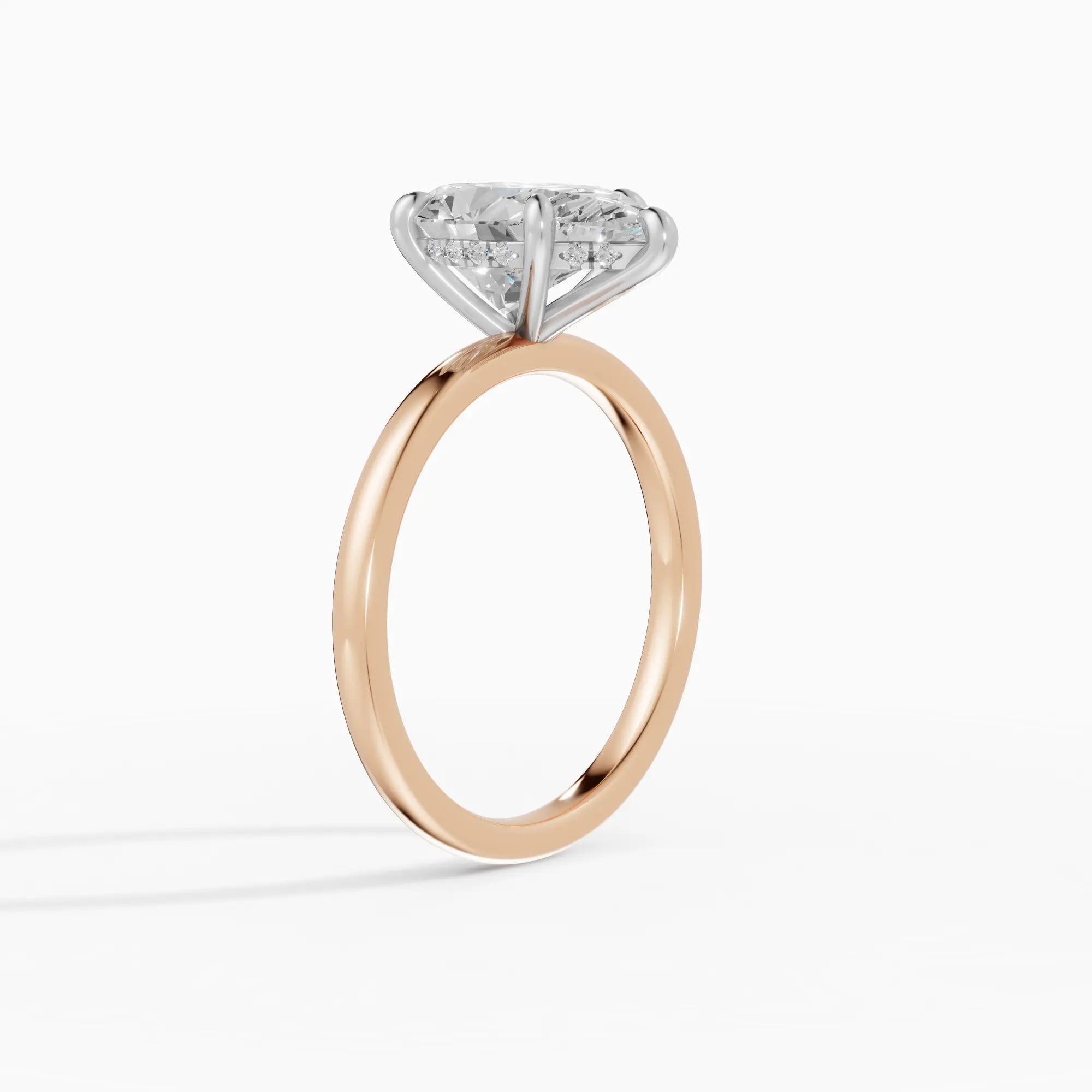 Anillo de compromiso THEIA pera solitario halo escondido