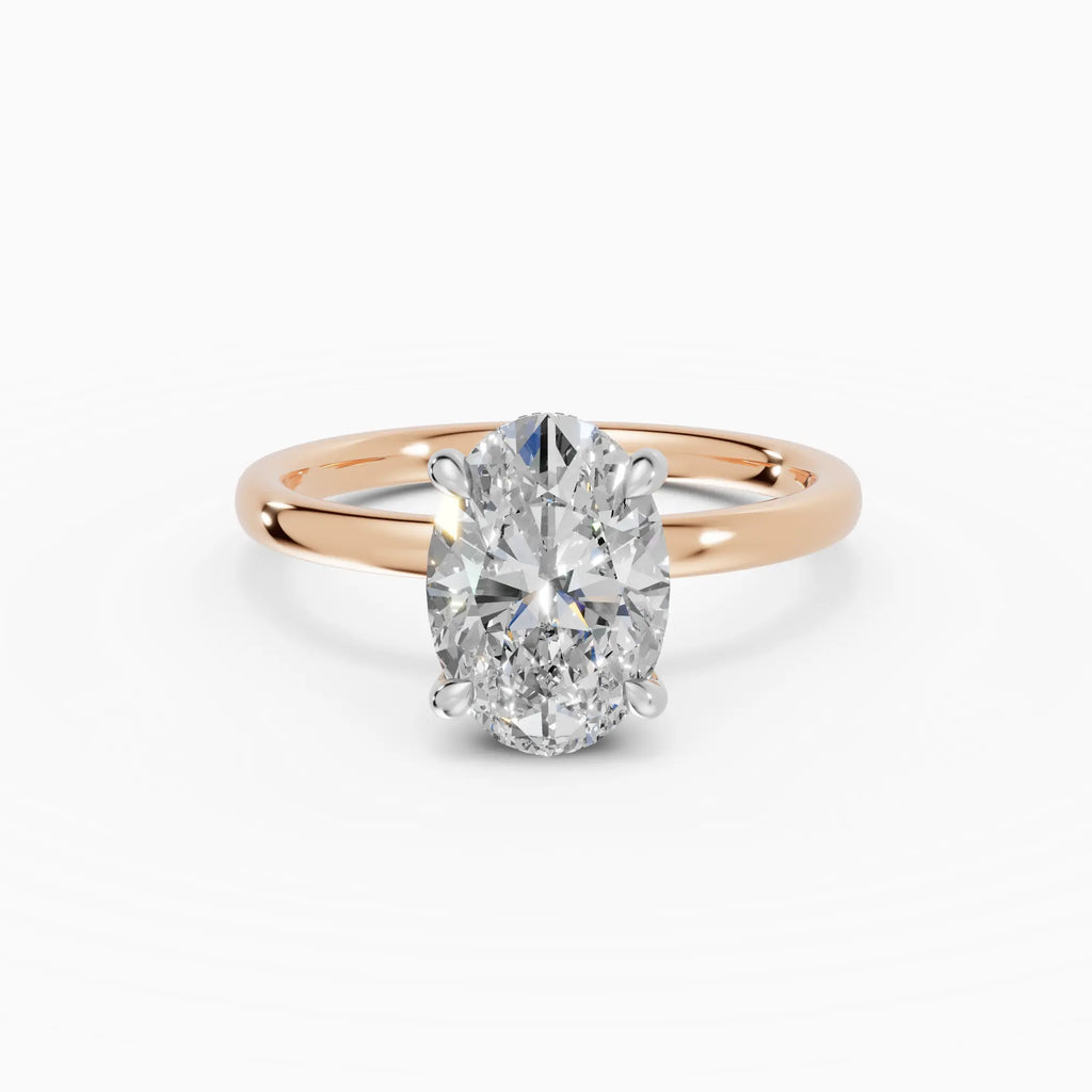 Anillo de compromiso THEIA oval solitario halo escondido