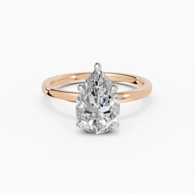 THEIA | Anillo solitario halo escondido pera