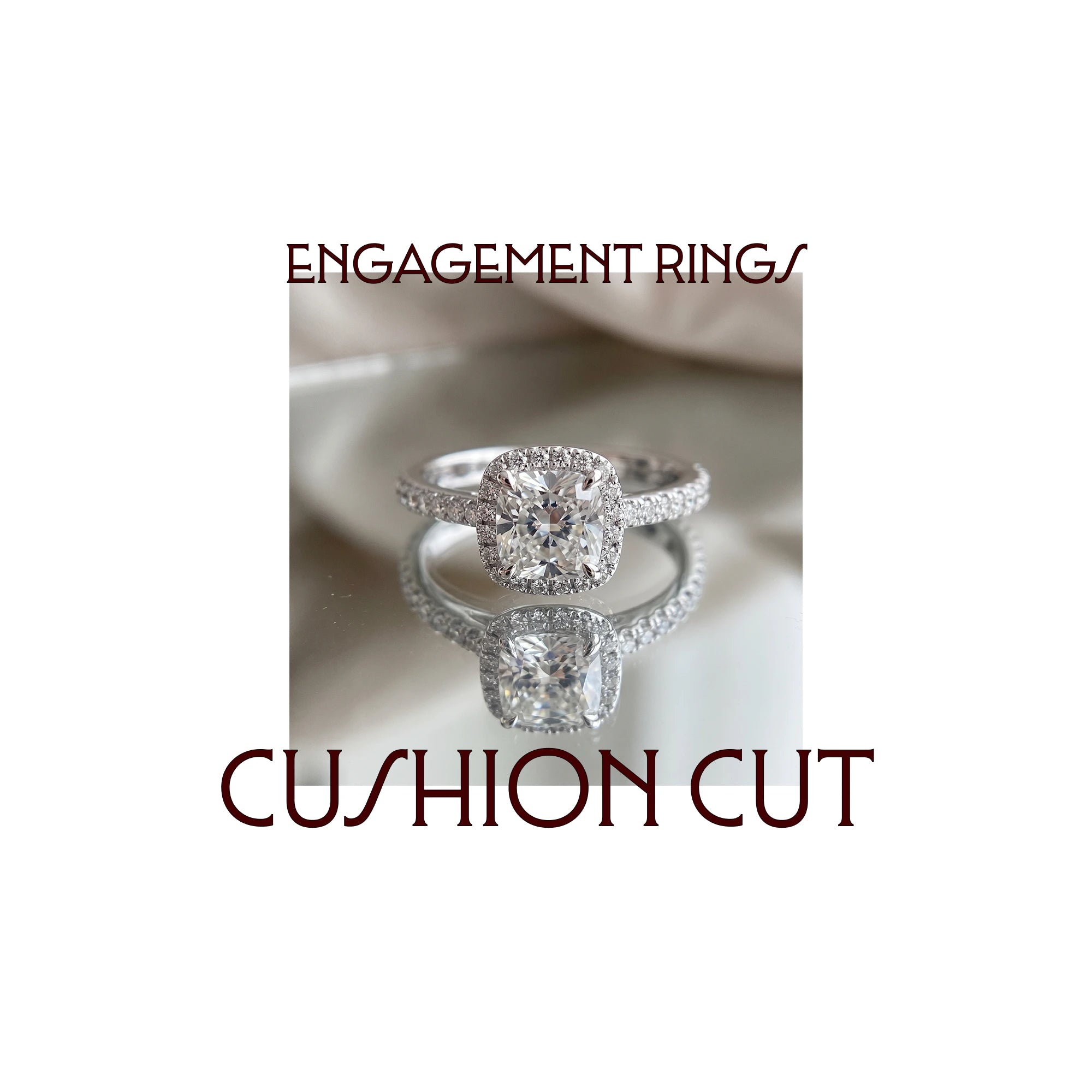 Anillo de compromiso corte cojín con halo de diamantes sobre superficie reflectante