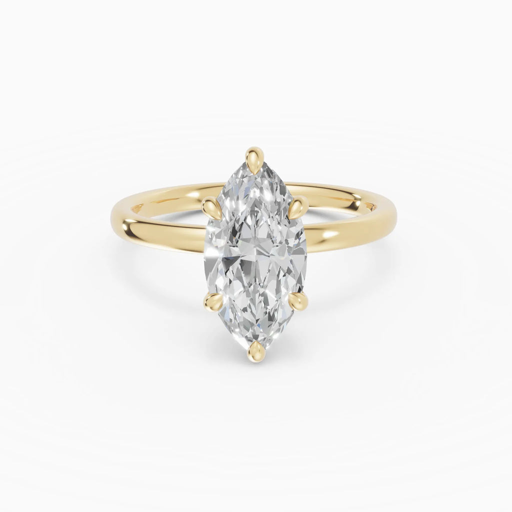 Anillo de compromiso THEIA marquesa solitario halo escondido en oro amarillo 18k