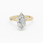 Anillo de compromiso THEIA marquesa solitario halo escondido en oro amarillo 18k