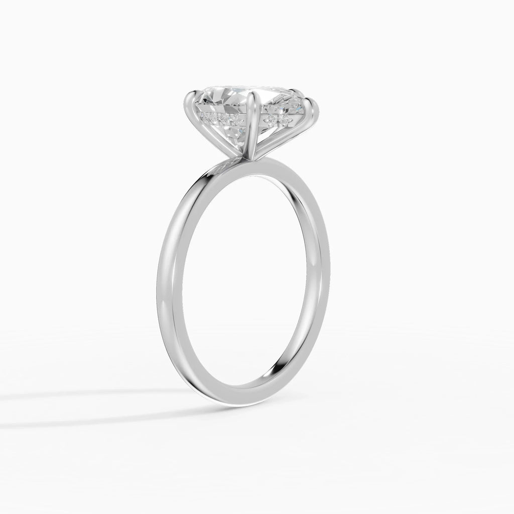 Anillo de compromiso THEIA pera solitario halo escondido - puesto en mano