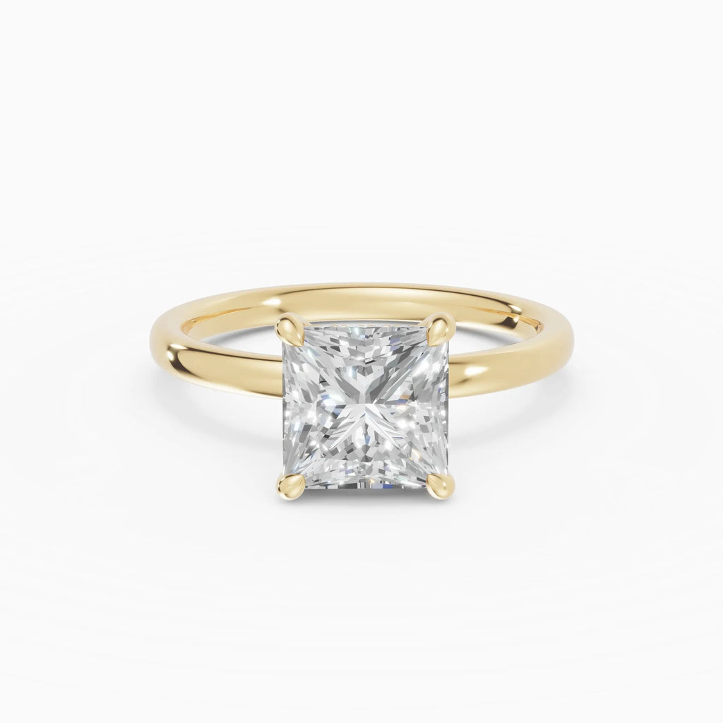 Anillo de compromiso THEIA princesa solitario halo escondido en oro amarillo 18k