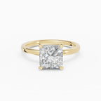 Anillo de compromiso THEIA princesa solitario halo escondido en oro amarillo 18k