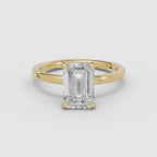 Vídeo 360° del anillo de compromiso THEIA solitario halo escondido esmeralda en oro amarillo