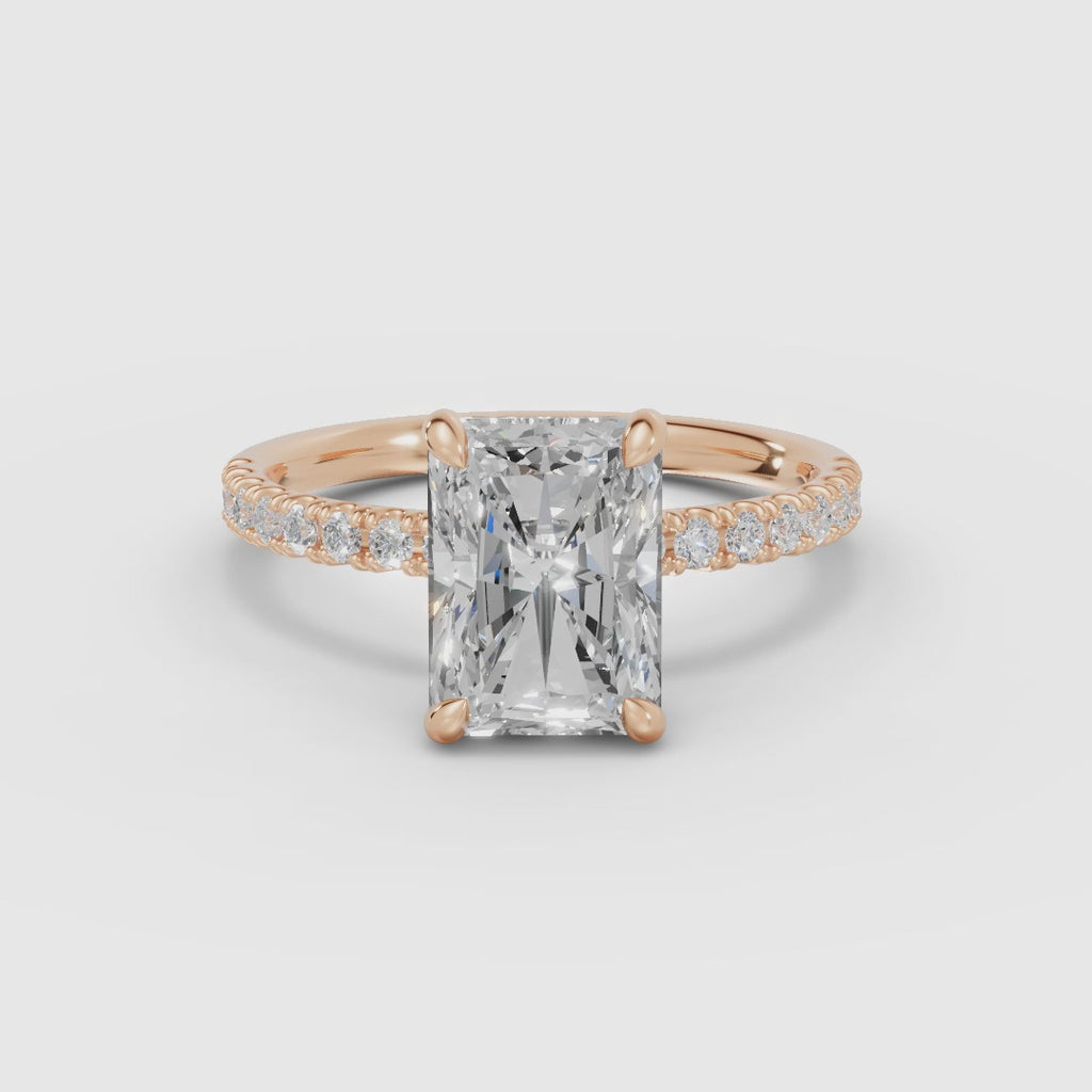 AURORA | Anillo solitario corte radiante medio pavé