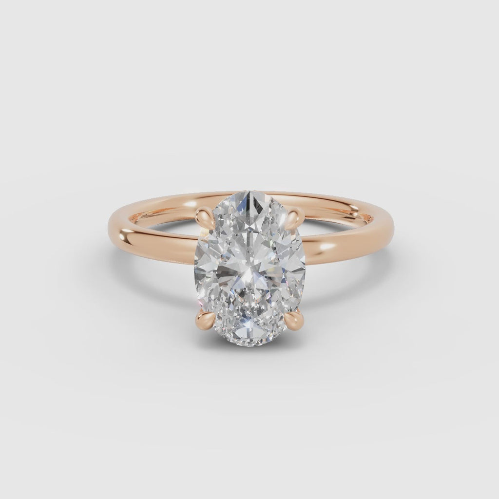 THEIA | Anillo solitario halo escondido oval
