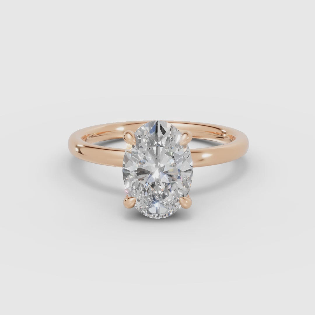 THEIA | Anillo solitario halo escondido oval
