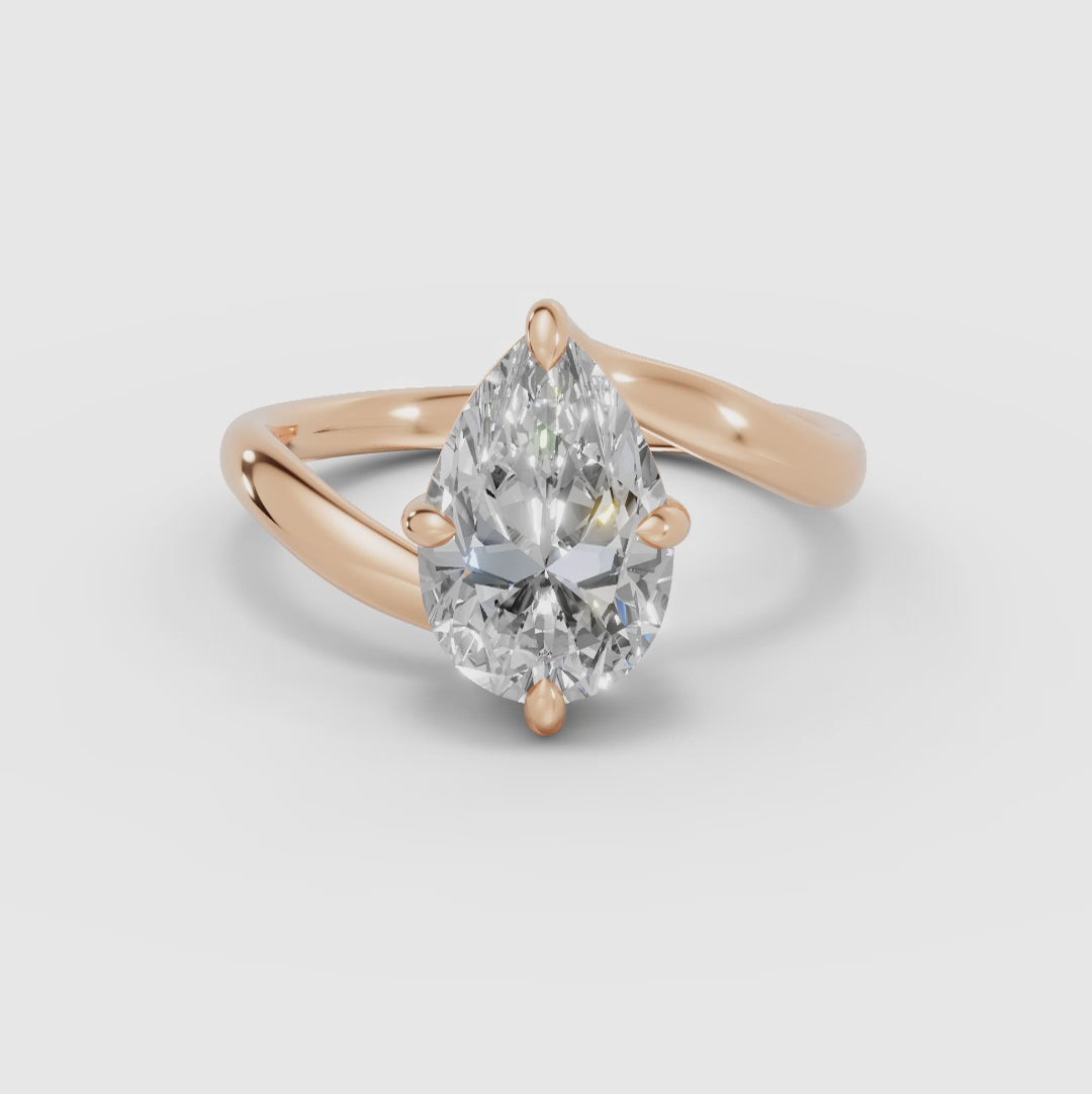 AXIS | Anillo pera con engaste compás bypass