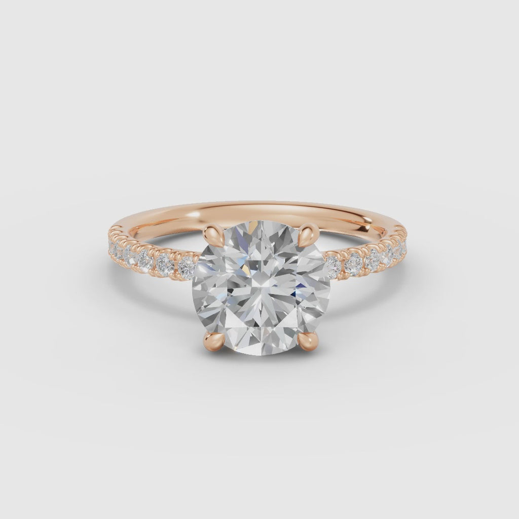 AURORA | Anillo solitario corte brillante medio pavé