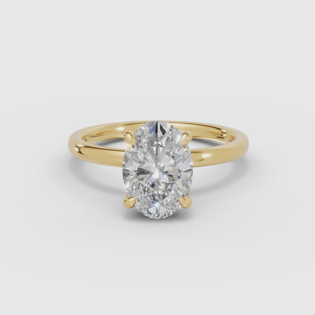 THEIA | Anillo solitario halo escondido oval