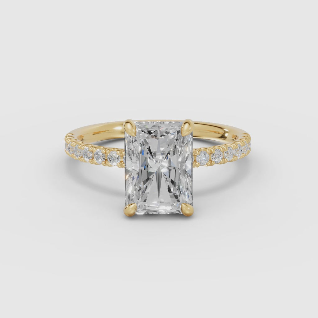 AURORA | Anillo solitario corte radiante medio pavé