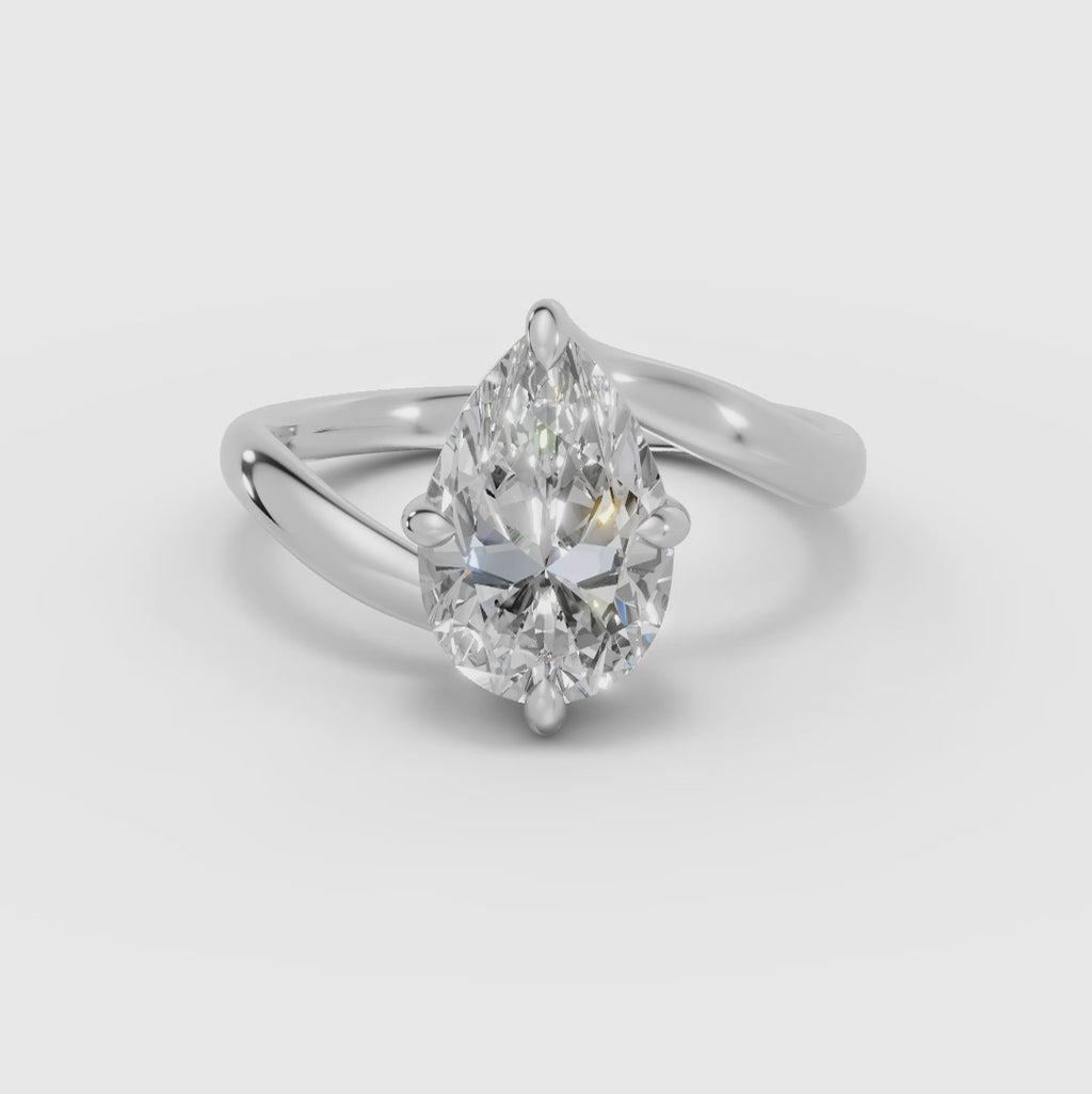 AXIS | Anillo pera con engaste compás bypass