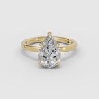 Vídeo 360° del anillo de compromiso THEIA solitario halo escondido pera en oro amarillo